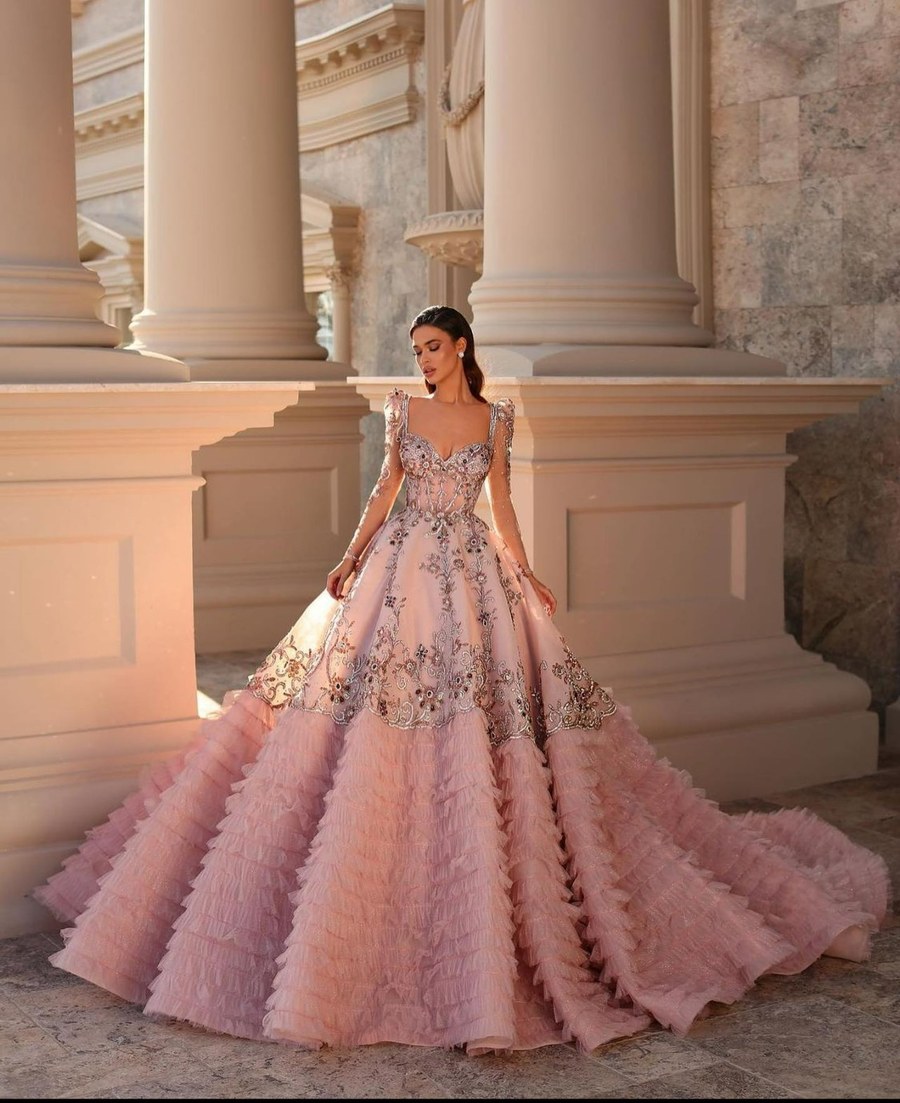 Client wearing Lumière pink palace ballgown — custom bespoke gown Los Angeles